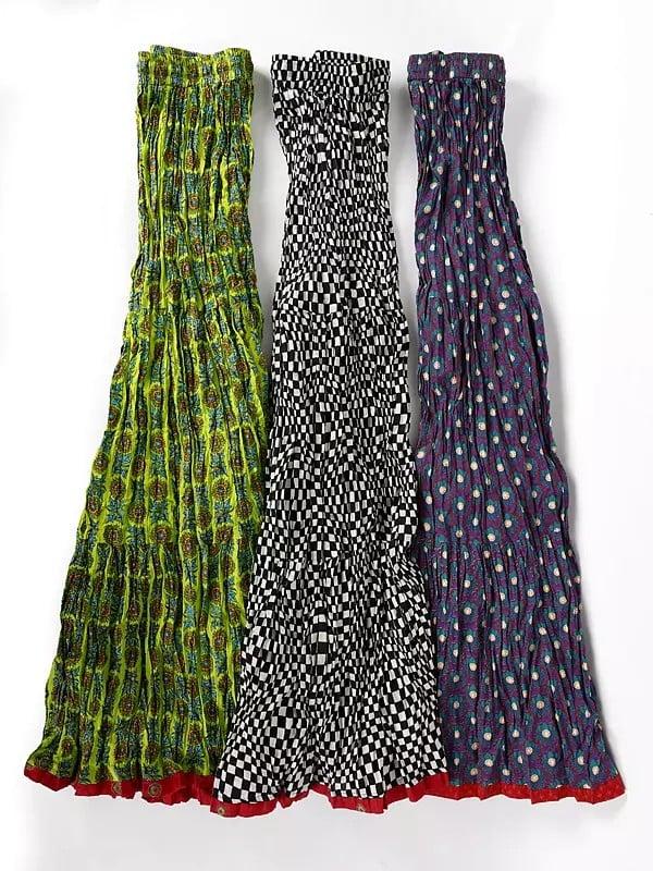 exotic india Bundle of Three Elastic Waist Long Ghagra Skirts from Jodhpur with All-Over Print 