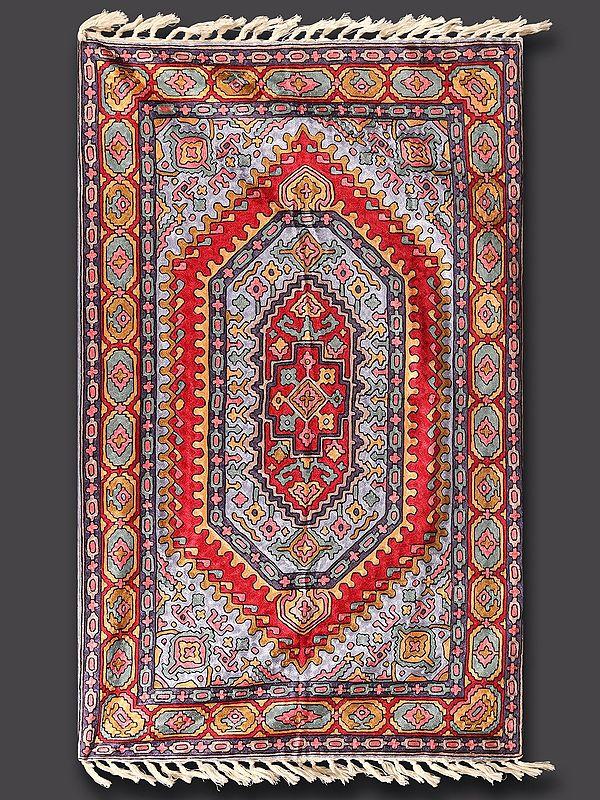 Exotic India Chambray-Blue Kashmiri Carpet With Tassels And Chain Stitched Persian Motifs 