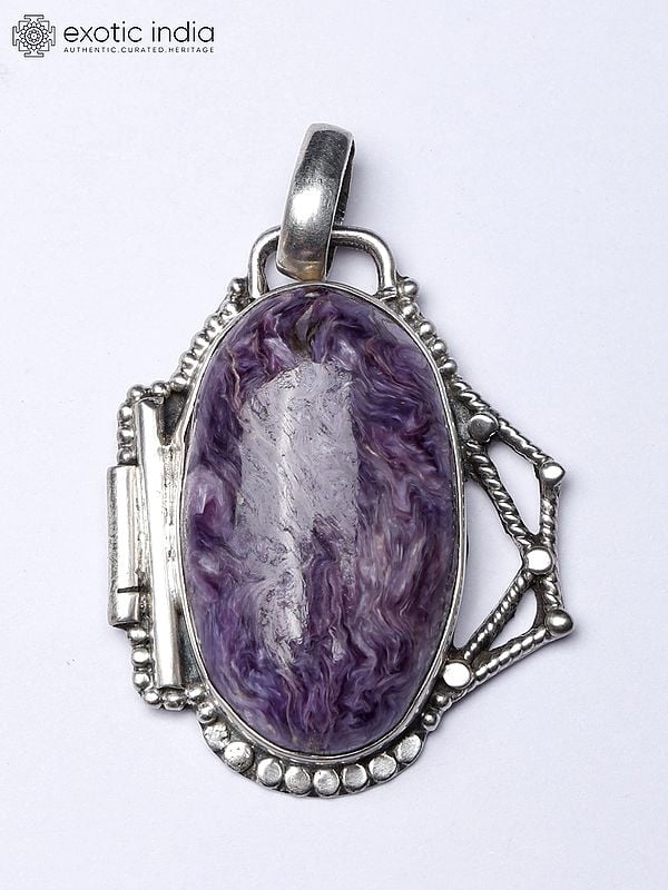 Exotic India Chaorite Cabochon Pendant In Sterling Silver 