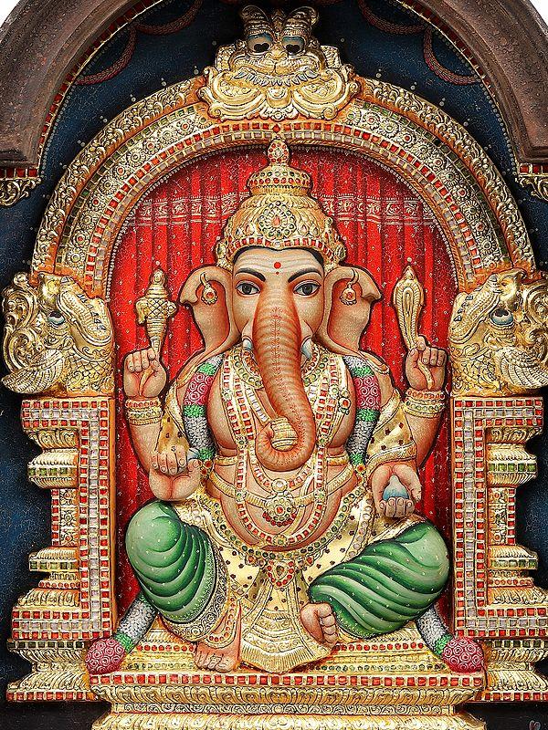 Exotic India Chaturbhuja Ganesha Seated On Kirtimukha Throne | 22 Karat Gold Embossed Work | Arch Shape Teakwood Frame