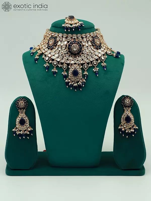 exotic india Choker Design Elegant Stone Studded And Beaded Necklace With Earrings And Mangtika 