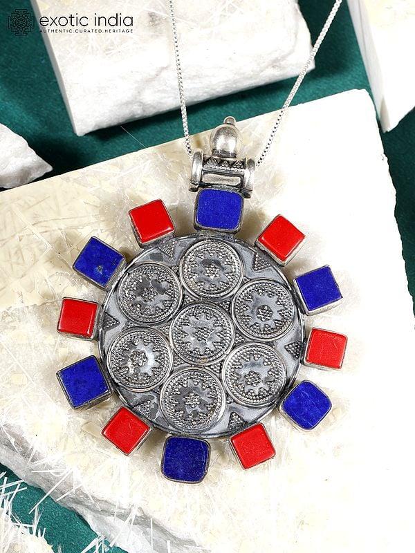 Exotic India Circular Sterling Silver Pendant With Coral And Lapis Lazuli