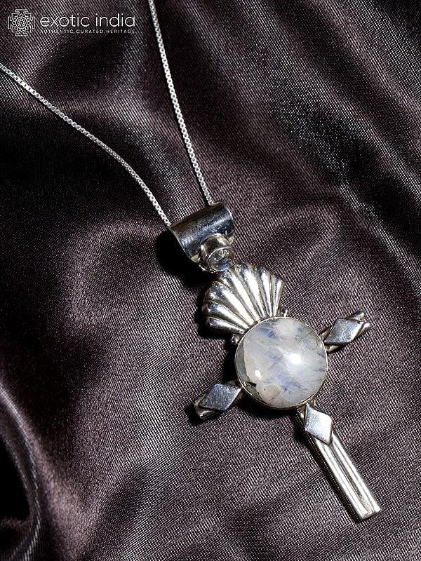 Exotic India Cross Pendant With Round Cut Rainbow Moonstone