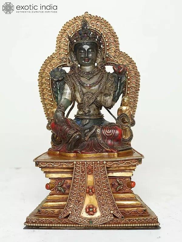 exotic india Crystal Goddess Green Tara Seated On Ornamented Throne In Blessing Gesture 