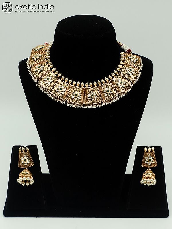 exotic india Designer Necklace Set In Matte Finish With Carving And Attractive Earrings 
