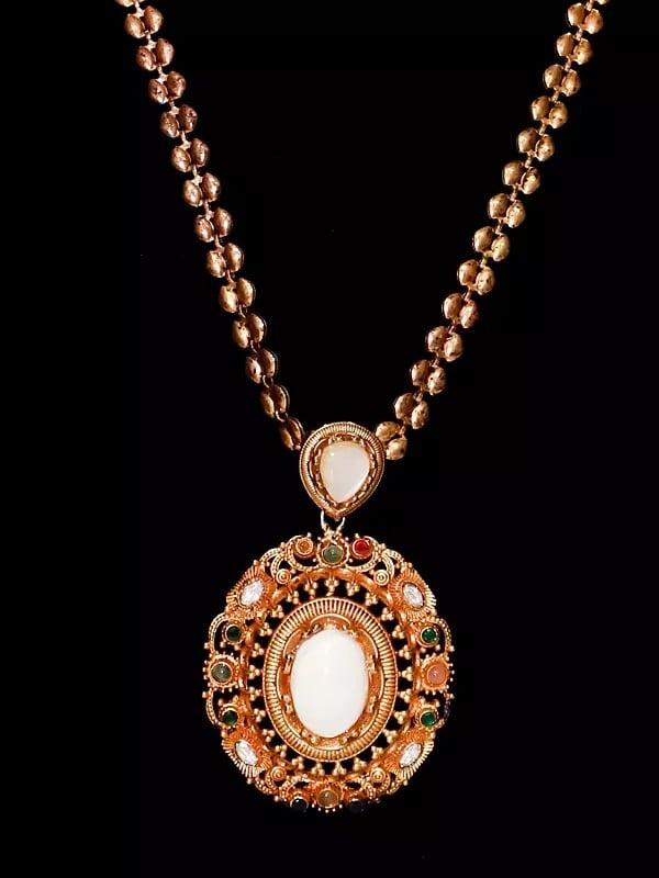 Exotic India Designer Oval Shaped Stone Studded Pendant Set With Earrings