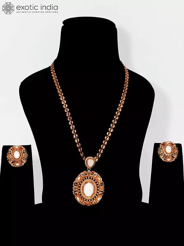 exotic india Designer Oval Shaped Stone Studded Pendant Set With Earrings
