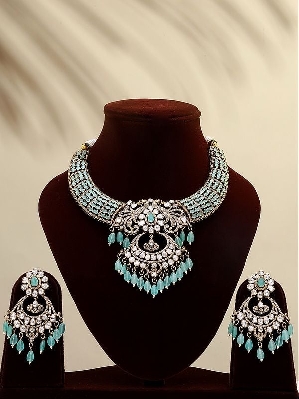exotic india Designer Stone Studded Necklace and Earrings Set with Dangling Beads 