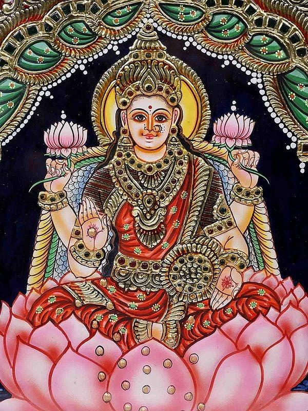 Exotic India Devi Lakshmi Seated On Lotus Framed Tanjore Painting | 24 Karat Gold Work 