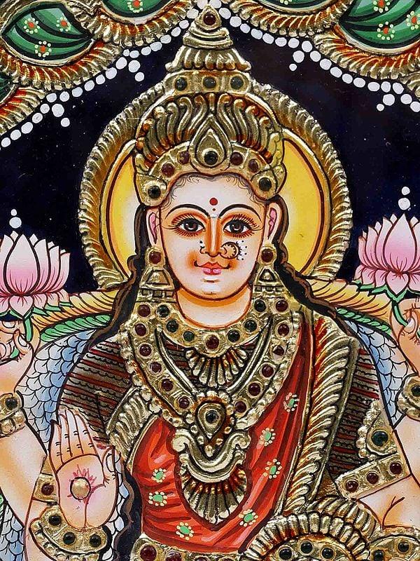Exotic India Devi Lakshmi Seated On Lotus Framed Tanjore Painting | 24 Karat Gold Work 