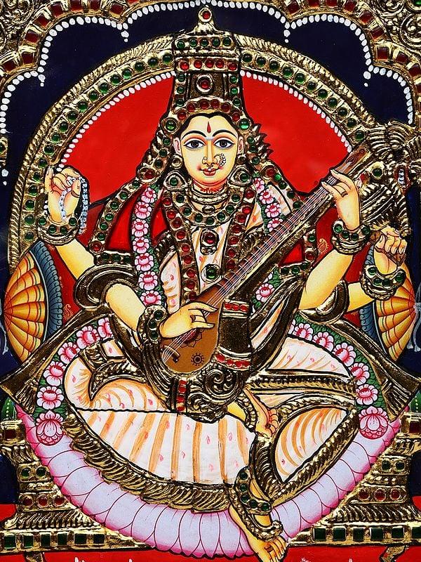 Exotic India Devi Saraswati | Framed Tanjore Painting 