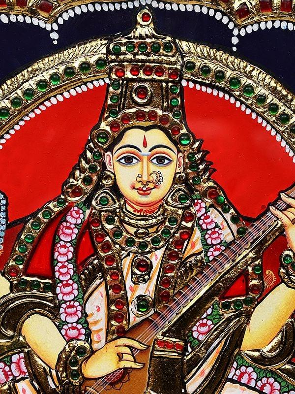 Exotic India Devi Saraswati | Framed Tanjore Painting 