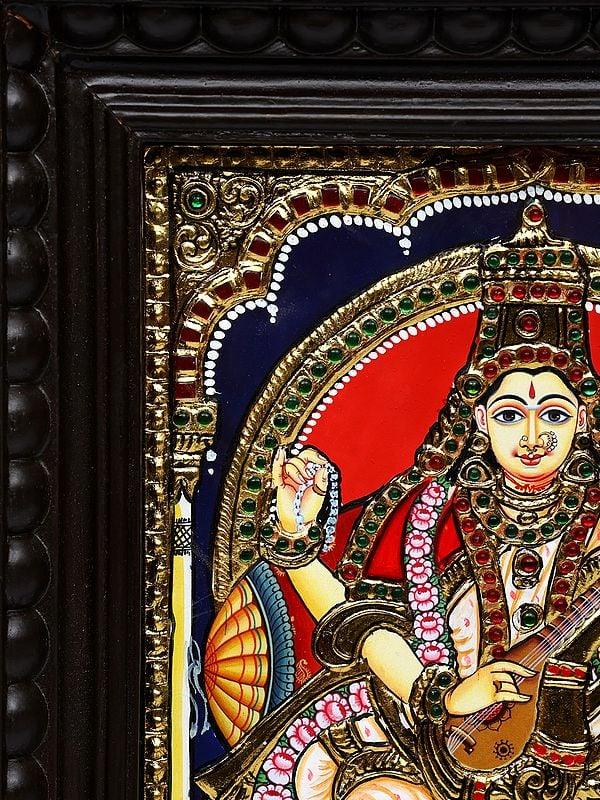 Exotic India Devi Saraswati | Framed Tanjore Painting 