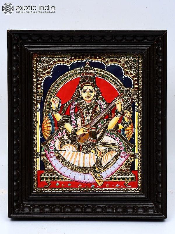 exotic india Devi Saraswati | Framed Tanjore Painting