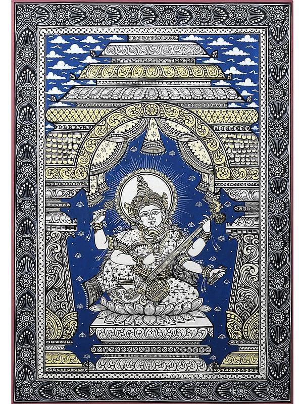 exotic india Devi Saraswati Seated on Lotus Playing Veena | Pattachitra Painting from Odisha 