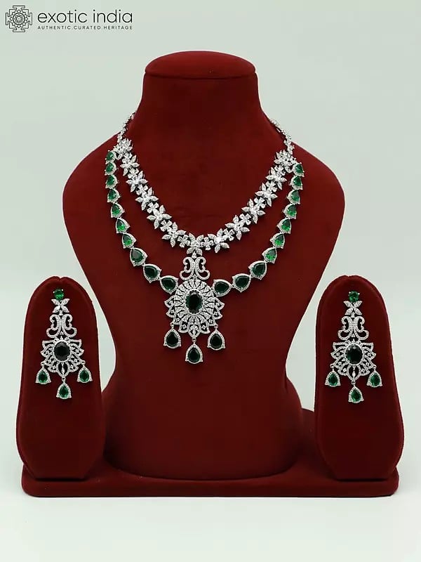exotic india Double Layered Floral Design Stone Studded American Diamond Necklace Set With Earrings