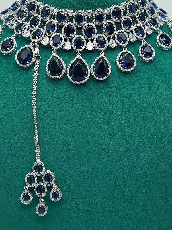 Exotic India Elegant American Diamond Stone Studded Choker Necklace With Earrings And Mangtika
