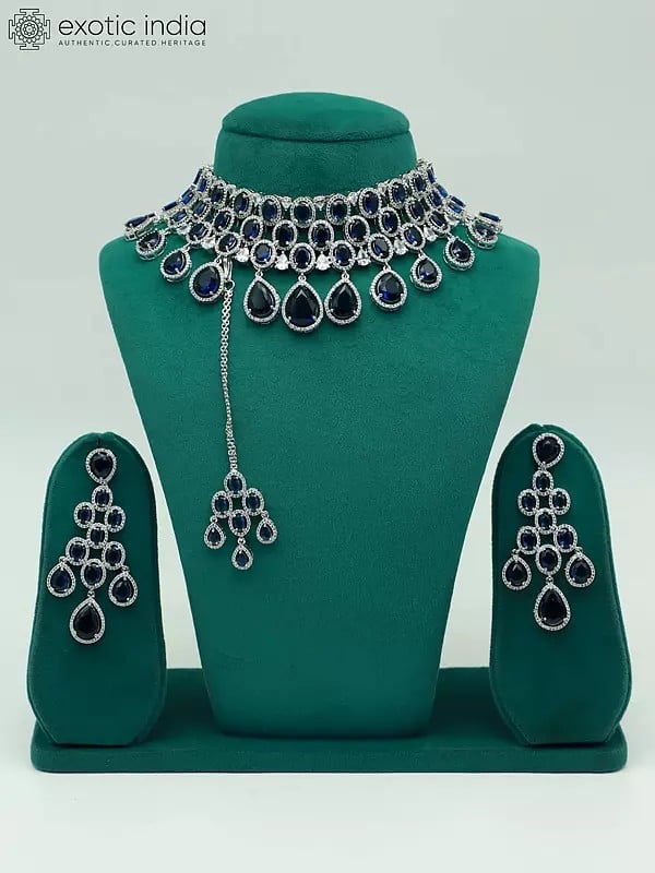 exotic india Elegant American Diamond Stone Studded Choker Necklace With Earrings And Mangtika 