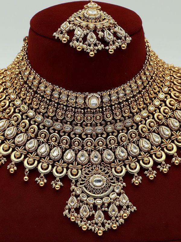 Exotic India Embellished Beaded And Stone Studded Choker Necklace With Attractive Earrings