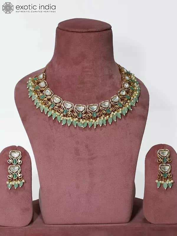 exotic india Embellished Copper And Kundan Stone Studded Beaded Necklace Set With Earrings 