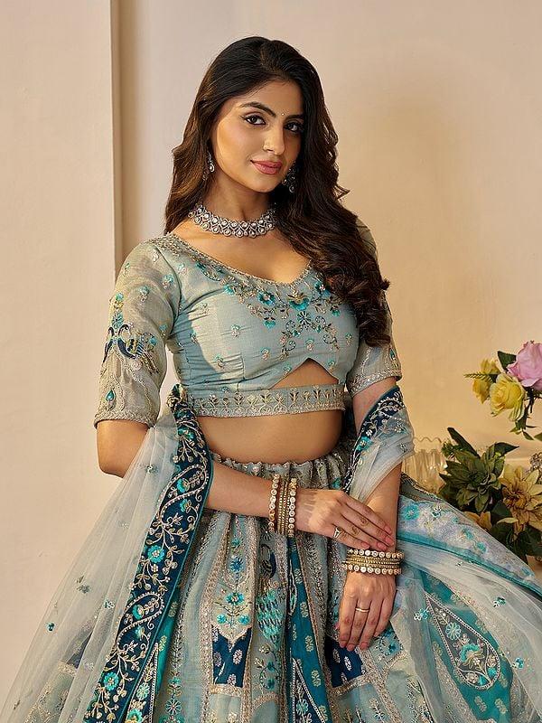 Exotic India Embellished Embroidery And Sequins Work Banarasi Silk Wedding Wear Lehenga Choli With Soft Net Dupatta