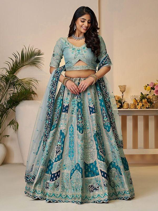 exotic india Embellished Embroidery And Sequins Work Banarasi Silk Wedding Wear Lehenga Choli With Soft Net Dupatta 