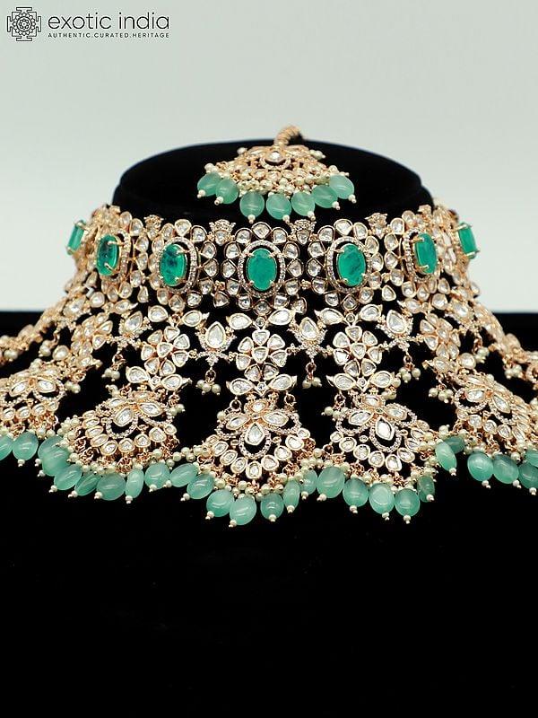 Exotic India Embellished Floral Design Stone Studded And Beaded Choker Necklace With Earrings And Mangtika