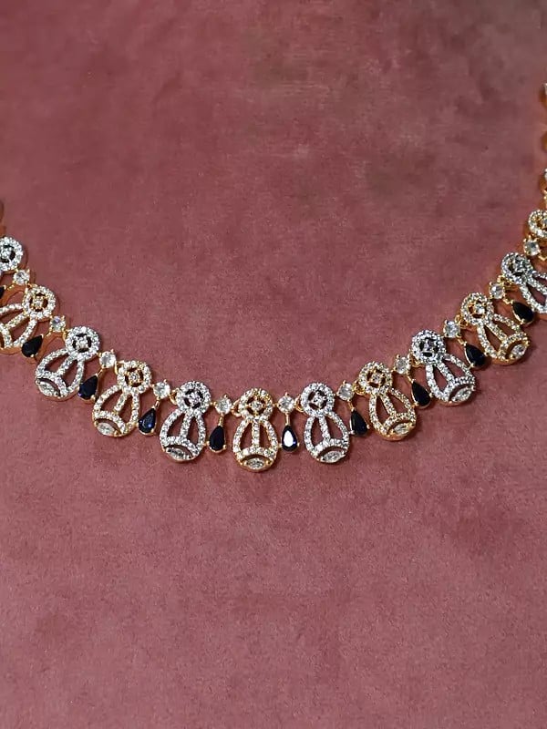 Exotic India Embellished Stone Studded American Diamond Necklace Set With Earrings