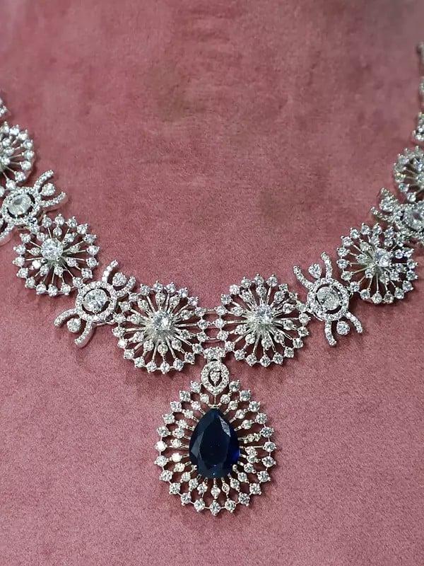 Exotic India Embellished Stone Studded American Diamond Necklace Set With Earrings