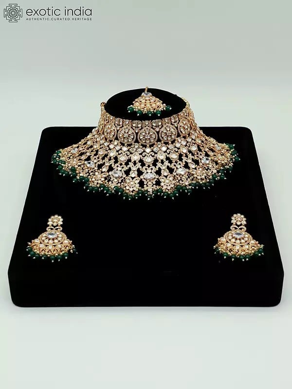 exotic india Embellished Stone Studded And Beaded Choker Necklace With Earrings And Mangtika 
