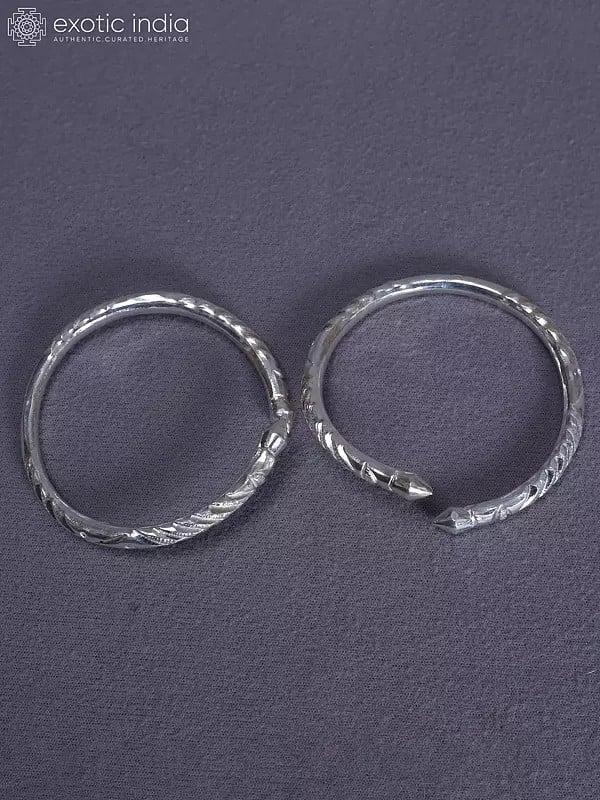 Exotic India Engraved Designer Pure Silver Set Of 2 Bala From Nepal 