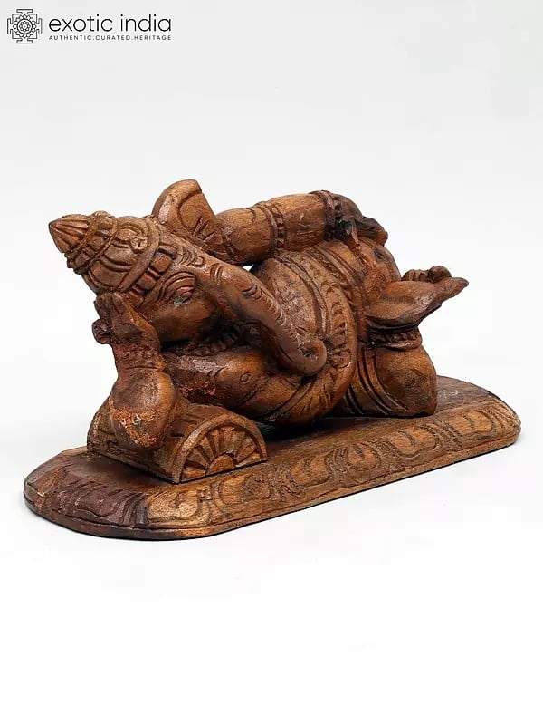 Exotic India 14" Relaxing Ganesha Statue In Wood 