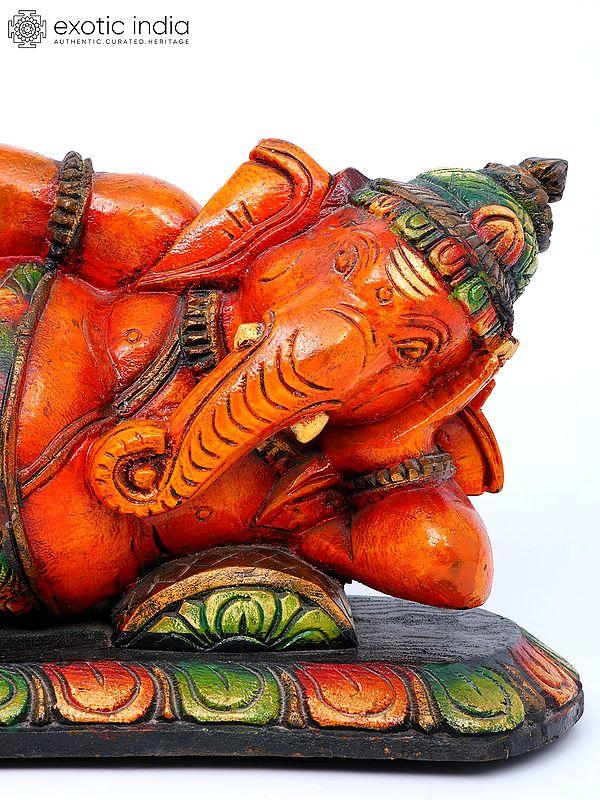 Exotic India 19" Relaxing Lord Ganesha | Wood Carving 
