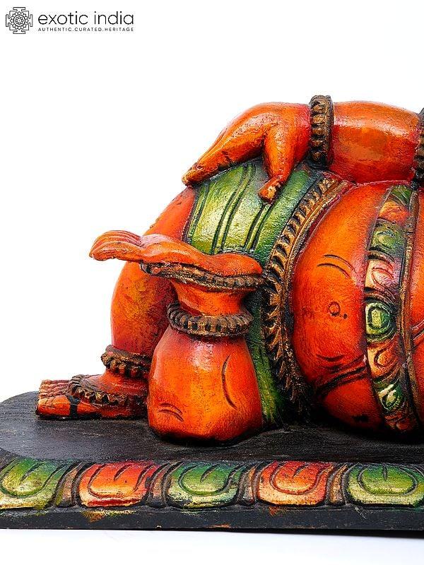 Exotic India 19" Relaxing Lord Ganesha | Wood Carving 