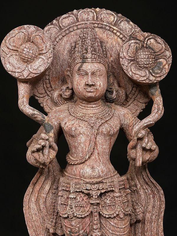 Exotic India 28" Lord Surya Holding Two Lotuses 