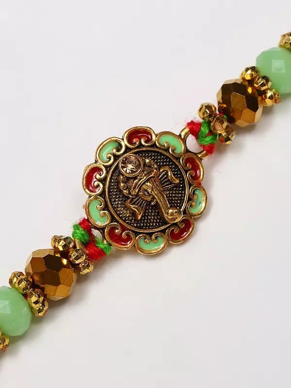 Exotic India Beaded Lord Ganesha Face Rakhi 