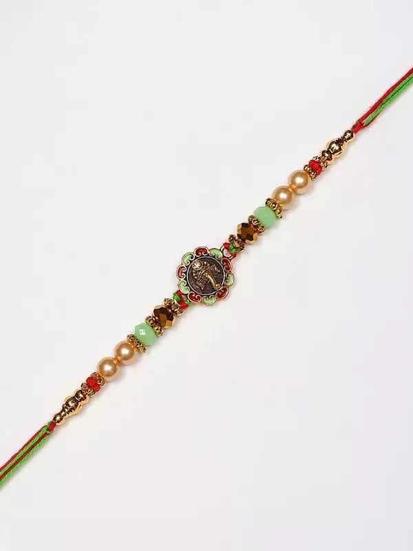 exotic india Beaded Lord Ganesha Face Rakhi 