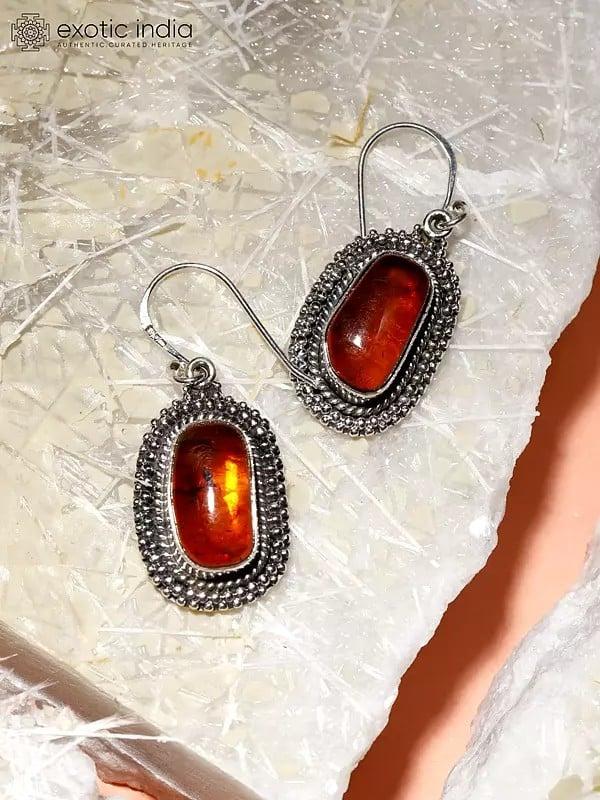 Exotic India Oval Shape Baltic Amber Hook Earrings 