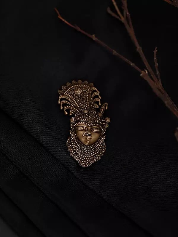 Exotic India Shrinathji Face Brass Brooch 