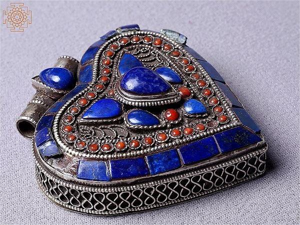 Exotic India Silver Heart Decorated Ghau Pendant