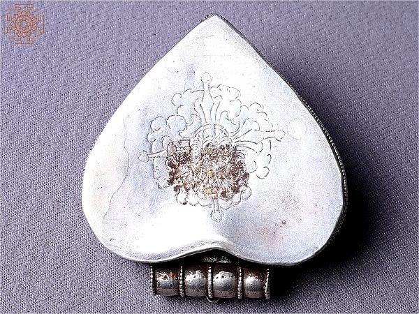 Exotic India Silver Heart Decorated Ghau Pendant