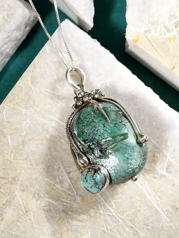 Exotic India Spider Web Turquoise Pendant