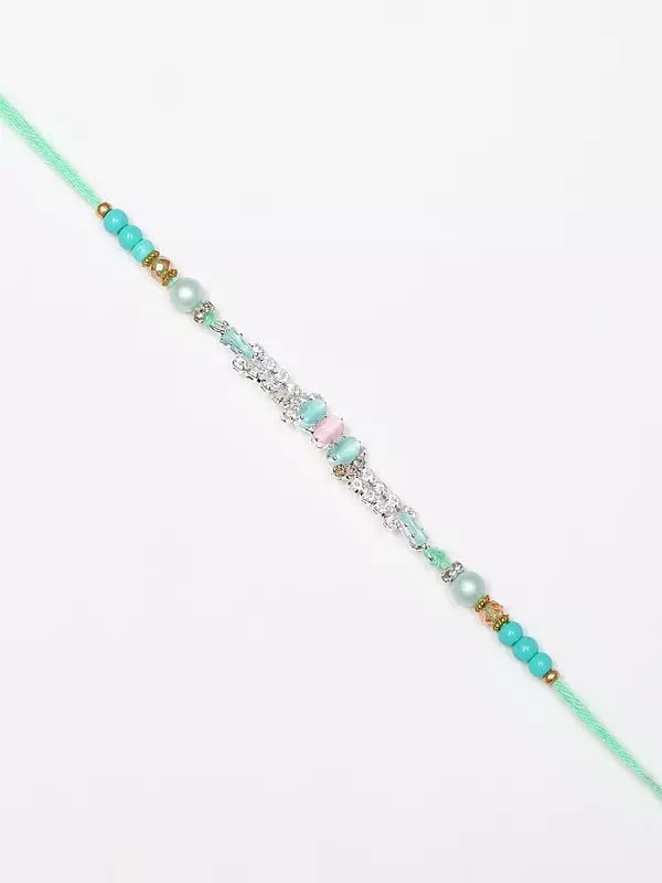 exotic india Stone Studded and Beaded Rakhi 