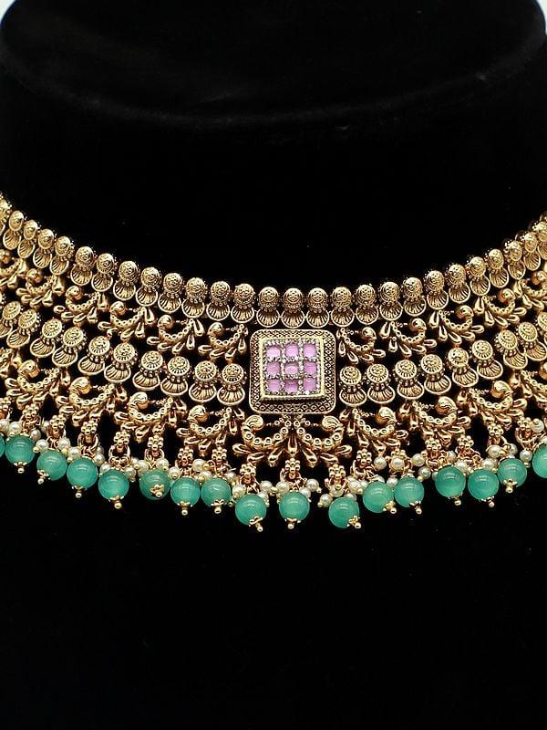 Exotic India Exquisite Beaded And Stone Studded Choker Style Necklace With Attractive Earrings And Mangtika