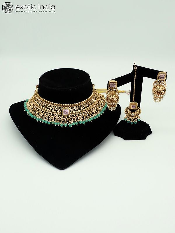 exotic india Exquisite Beaded And Stone Studded Choker Style Necklace With Attractive Earrings And Mangtika