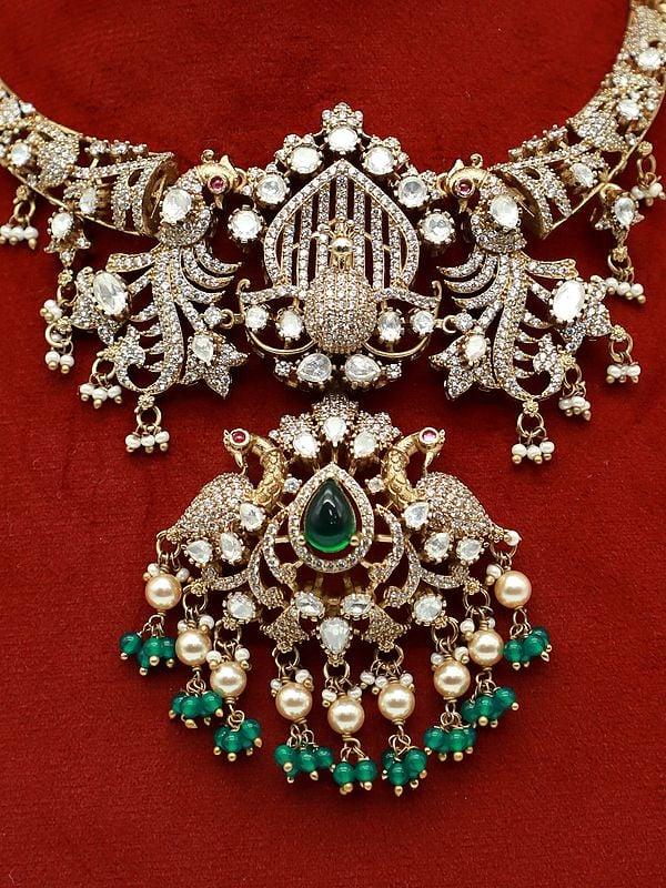 Exotic India Exquisite Peacock Design Stone Studded Moissanite Kundan With Matt Polish Necklace With Earrings 