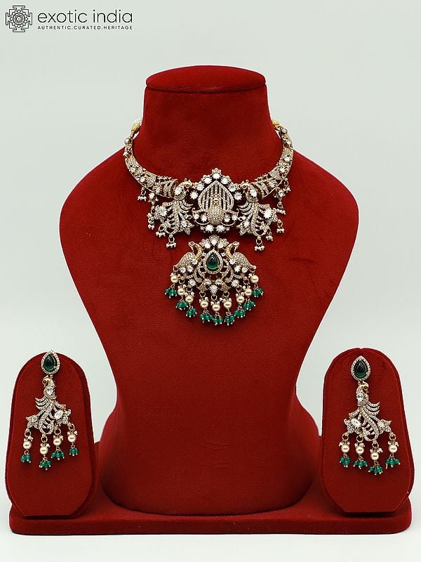 exotic india Exquisite Peacock Design Stone Studded Moissanite Kundan With Matt Polish Necklace With Earrings 