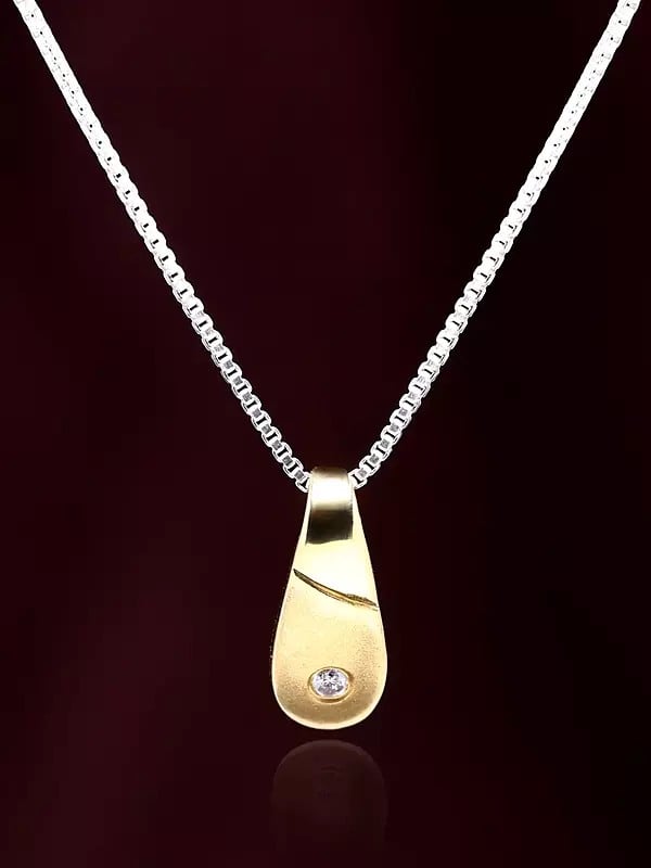 Exotic India Finely Crafted Gold Pendant With Diamond 