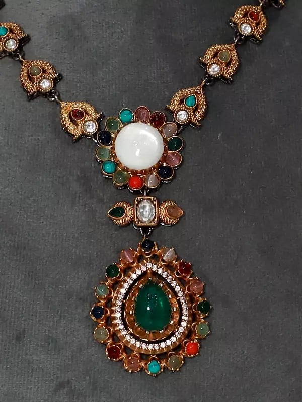 Exotic India Floral Design Embellished Stone Studded Necklace Set With Earrings 