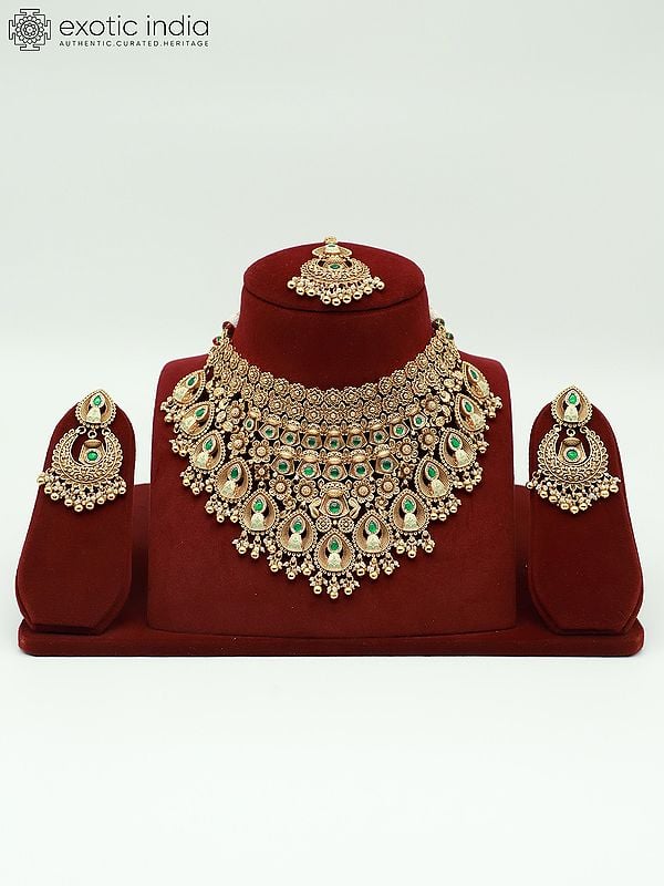 exotic india Floral Design Stone Studded And Beaded Choker Necklace With Matching Earrings And Mangtika